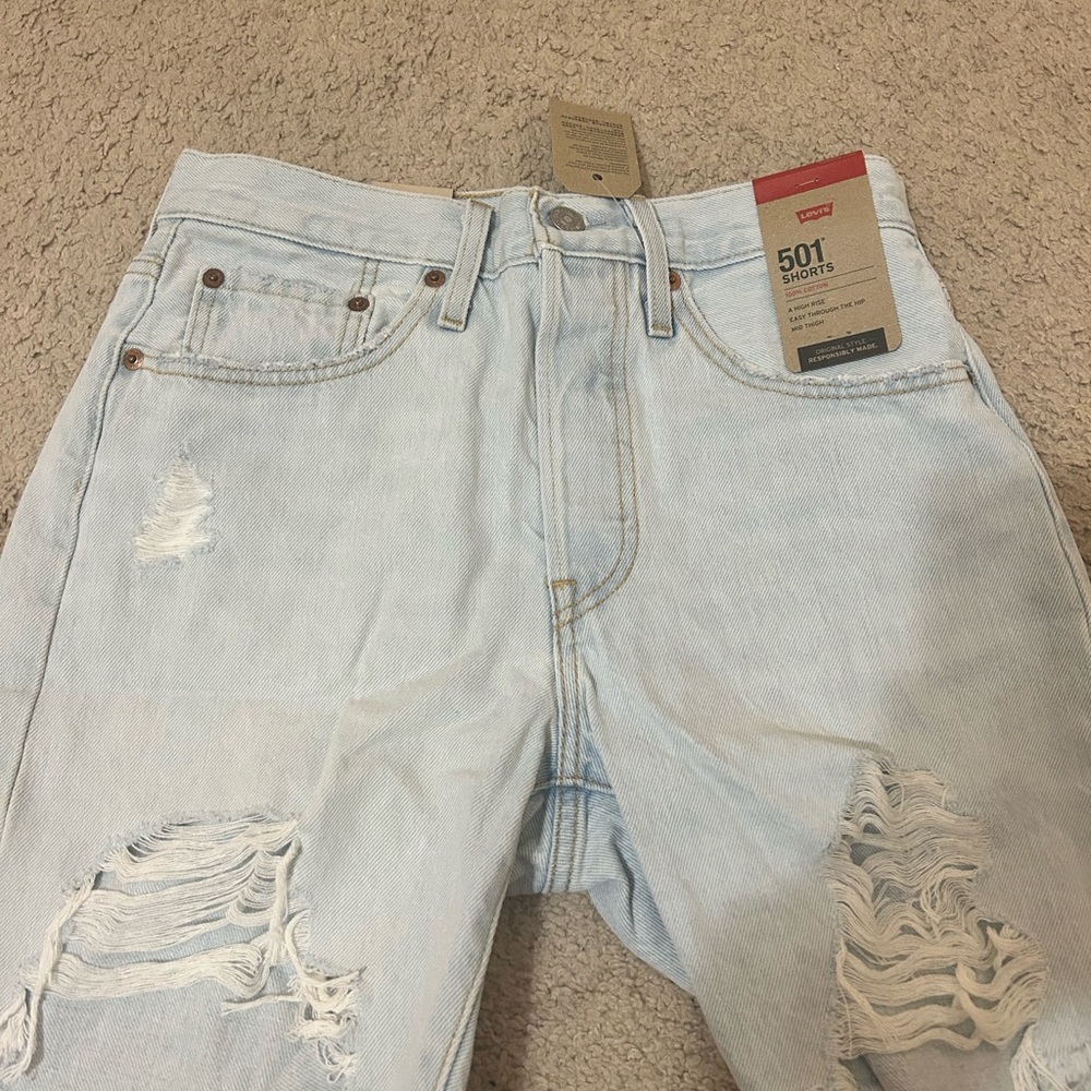 Brand new! Ordered and can’t return. Levi’s 501 Mid Shorts.